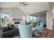 Comfortable living room featuring a cozy seating arrangement and a modern fireplace at 5736 Cadara Way, Parker, CO 80134