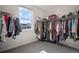 Walk-in closet featuring built-in storage and lots of light at 5736 Cadara Way, Parker, CO 80134