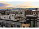 Rooftop patio with pergola provides outdoor living space for modern townhomes at 4062 W 16Th Ave, Denver, CO 80204