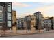 Modern townhome exteriors with clean lines, mixed materials, and private balconies at 4062 W 16Th Ave, Denver, CO 80204