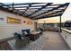 Relax on this rooftop patio with a pergola, string lights, and outdoor seating at 4062 W 16Th Ave, Denver, CO 80204