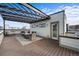 Spacious rooftop deck includes a pergola, seating area, and easy access to the home at 4062 W 16Th Ave, Denver, CO 80204