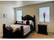 Spacious bedroom with a large bed and nightstands at 4680 Thistle Dr, Brighton, CO 80601