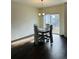 Bright dining room with a table and four chairs at 4680 Thistle Dr, Brighton, CO 80601