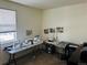 Home office with sewing machines and craft supplies at 4680 Thistle Dr, Brighton, CO 80601