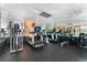 Community gym featuring treadmills, elliptical machines, weights and other fitness equipment at 2 Adams St # 608, Denver, CO 80206