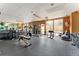 Fully equipped gym with mirrored walls and a variety of exercise equipment for a complete fitness routine at 2 Adams St # 608, Denver, CO 80206