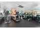 Bright gym featuring state-of-the-art equipment and mirrored walls for an invigorating workout at 2 Adams St # 608, Denver, CO 80206