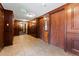 Hallway with wood trim and elevator at 2 Adams St # 608, Denver, CO 80206