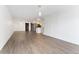 Spacious living room with modern floors, open layout and with lots of light from open kitchen and front door at 2 Adams St # 608, Denver, CO 80206