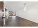 Bright and open living space with gray flooring and a balcony offering city views at 2 Adams St # 608, Denver, CO 80206