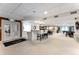 Spacious recreation room with a kitchenette, bar seating, billiard tables, and a comfortable lounge area at 2 Adams St # 608, Denver, CO 80206