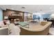 Cozy recreation room featuring a stone fireplace, comfortable seating, and table tennis for entertainment at 2 Adams St # 608, Denver, CO 80206