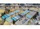 Aerial view of well-maintained tennis courts with colorful playing surfaces and ample parking at 2 Adams St # 608, Denver, CO 80206