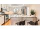 Modern kitchen with stainless steel appliances and granite countertops at 3242 S Heather Gardens Way, Aurora, CO 80014