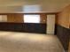 Spacious basement with brick accents and a neutral carpet at 2043 S Salida St, Aurora, CO 80013