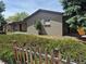 Attractive one-story brick home featuring an attached garage and well-maintained landscaping at 2043 S Salida St, Aurora, CO 80013