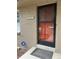 Close-up of the front door with mosaic house number and ADT security sign at 2043 S Salida St, Aurora, CO 80013