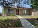 Charming single story brick home with front porch and walkway at 2043 S Salida St, Aurora, CO 80013