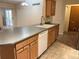 Spacious kitchen island with sink, faucet, and view to outdoor area at 2043 S Salida St, Aurora, CO 80013