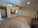 Open floor plan with seamless flow from living room to kitchen with breakfast bar at 2043 S Salida St, Aurora, CO 80013