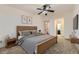 Cozy bedroom featuring a ceiling fan and neutral tones at 735 S Clinton St # 5B, Denver, CO 80247