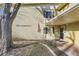 Charming building entrance with address display and brick facade at 735 S Clinton St # 5B, Denver, CO 80247