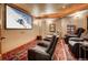 Home theater with comfortable seating, large screen, and cozy ambiance at 127 Marks Ln, Breckenridge, CO 80424