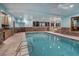 Beautiful indoor pool with stone accents and bright, airy atmosphere at 127 Marks Ln, Breckenridge, CO 80424