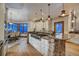Well-appointed kitchen with an oversized stone breakfast bar and stainless steel appliances at 127 Marks Ln, Breckenridge, CO 80424