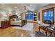 Spacious main bedroom with a fireplace, sitting area, and ample natural light at 127 Marks Ln, Breckenridge, CO 80424