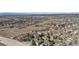 Extensive aerial view of a community showcasing residential area, green spaces, and walking paths at 9431 Crossland Way, Highlands Ranch, CO 80130