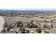 Expansive aerial view of townhomes with nearby walking trails and stunning mountain views at 9431 Crossland Way, Highlands Ranch, CO 80130
