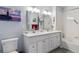 Bathroom featuring double sinks, vanity, mirrors and shower at 9431 Crossland Way, Highlands Ranch, CO 80130