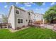 Expansive backyard features a deck, patio, and lush lawn, perfect for outdoor living at 20304 Vista Cir, Parker, CO 80138