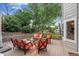 View of the wood deck with outdoor seating, cushions, and a glass table at 20304 Vista Cir, Parker, CO 80138
