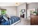 Spacious main bedroom with ensuite access, vaulted ceilings, natural light, and stylish neutral decor at 20304 Vista Cir, Parker, CO 80138
