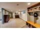 Finished basement featuring storage, kitchenette, and a cozy seating area at 9650 W 35Th Ave, Wheat Ridge, CO 80033