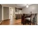 Finished basement features a bar with two bar stools and a convenient kitchenette at 9650 W 35Th Ave, Wheat Ridge, CO 80033