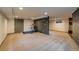 Spacious basement area complete with exercise equipment, new carpet, and a modern paint scheme at 9650 W 35Th Ave, Wheat Ridge, CO 80033