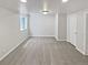 Basement bedroom provides ample space, natural light, and a neutral color scheme at 23559 Branston Ln, Parker, CO 80138