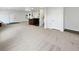 Spacious basement with neutral carpet and bar area is perfect for entertaining at 23559 Branston Ln, Parker, CO 80138
