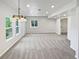 Finished basement with large windows and recessed lighting provides a great living space at 23559 Branston Ln, Parker, CO 80138