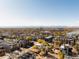 Wide aerial showcasing the community and mountain views at 3437 W 17Th Ave, Denver, CO 80204