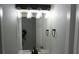 Bathroom vanity featuring new sink and modern fixtures and mirror at 8832 Lipan St, Thornton, CO 80260