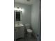 Half bathroom with a modern sink and toilet at 8832 Lipan St, Thornton, CO 80260