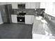 Kitchen with granite countertops and stainless steel appliances at 8832 Lipan St, Thornton, CO 80260
