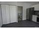 Kitchen featuring stainless refrigerator and tiled floors at 8832 Lipan St, Thornton, CO 80260