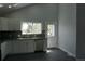 Kitchen featuring granite counters, modern cabinets, and stainless appliances at 8832 Lipan St, Thornton, CO 80260