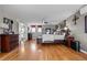Bright bedroom with hardwood floors, large windows, stylish decor, and comfortable furnishings at 446 Angus Way, Highlands Ranch, CO 80129